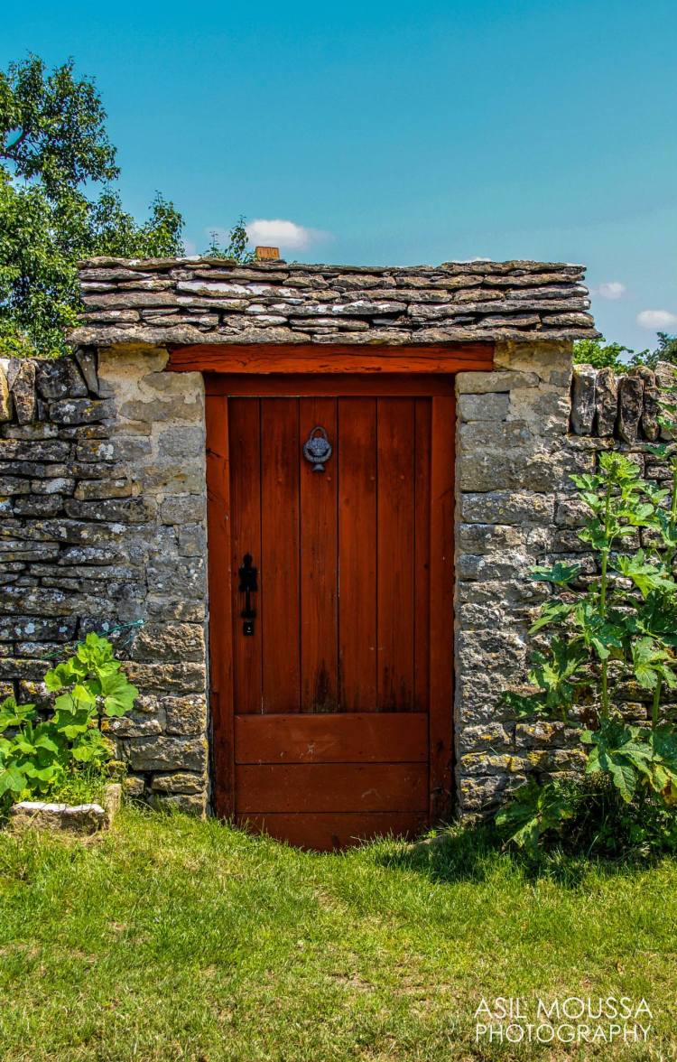 The Door to Neverland.  France has the coolest doors. This one looks like it belongs to a fairytale with a magical garden. 